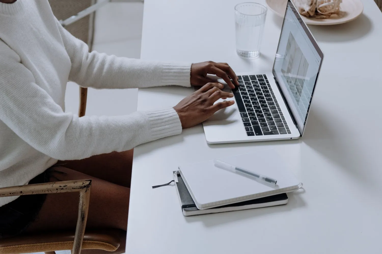 A person browsing a practice website on a laptop